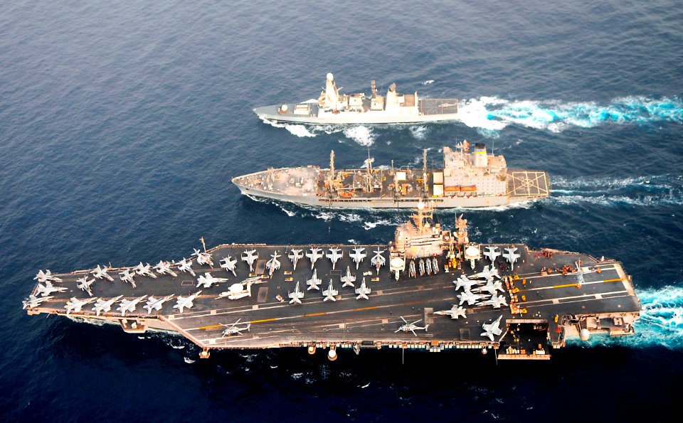 Flickr - Official U.S. Navy Imagery - USS Abraham Lincoln, USNS Guadalupe and HMS Daring conduct a replenishment-at-sea. (2)