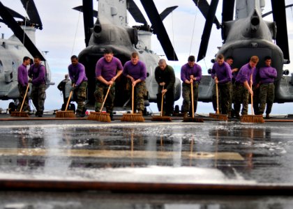 Flickr - Official U.S. Navy Imagery - USS Boxer Sailors clean the flight deck.