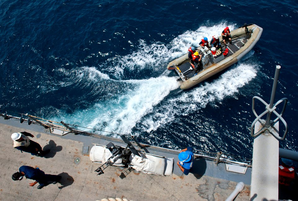 Flickr - Official U.S. Navy Imagery - USS Cape St. George deploys a rigid-hull inflatable boat for a marine artillery scout observer course.