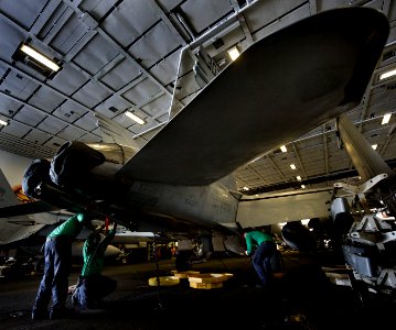 Flickr - Official U.S. Navy Imagery - USS Carl Vinson Sailors work on jet.