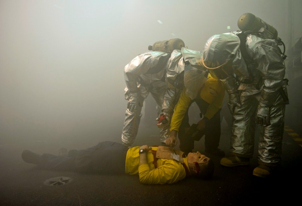 Flickr - Official U.S. Navy Imagery - USS Carl Vinson Sailors train with simulated fire drill.