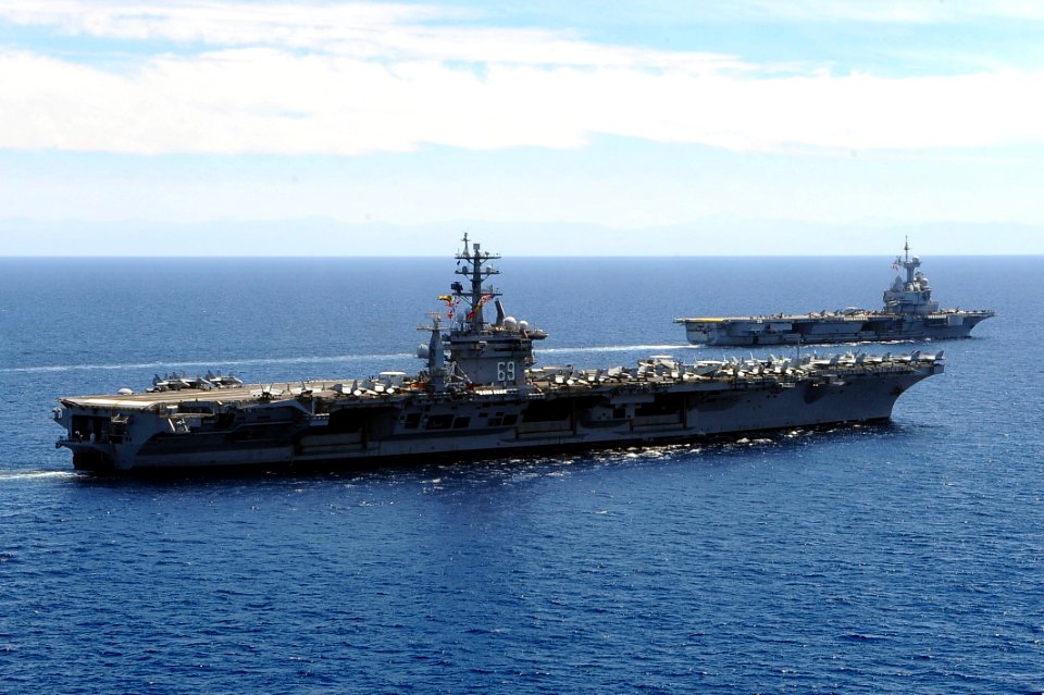 Flickr - Official U.S. Navy Imagery - USS Dwight D. Eisenhower and French aircraft carrier Charles de Gaulle are underway in the Mediterranean Sea.