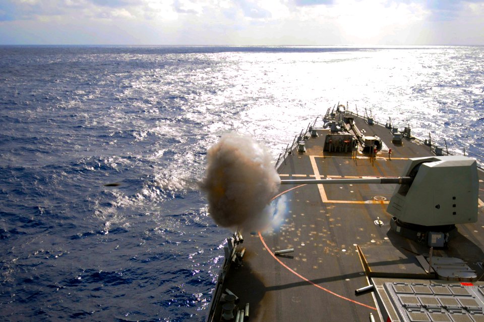 Flickr - Official U.S. Navy Imagery - USS Mustin fires it 5-inch gun at sea.