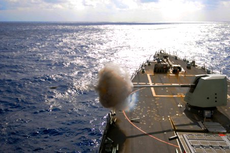 Flickr - Official U.S. Navy Imagery - USS Mustin fires it 5-inch gun at sea. photo