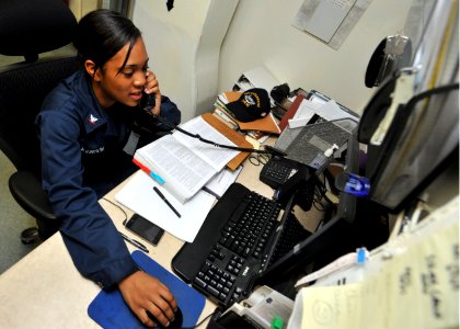 Flickr - Official U.S. Navy Imagery - USS Enterprise Sailor helps her shipmates with legal paperwork.