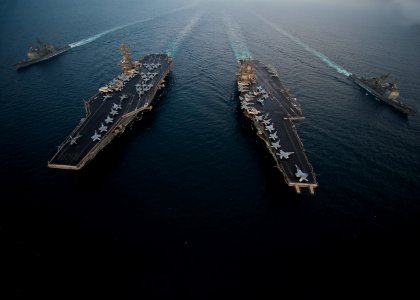 Flickr - Official U.S. Navy Imagery - USS Enterprise, USS Dwight D. Eisenhower, USS Vicksburg and USS Hue City are underway in formation.