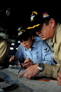 Flickr - Official U.S. Navy Imagery - USS Ronald Reagan's navigator checks the ship's position.