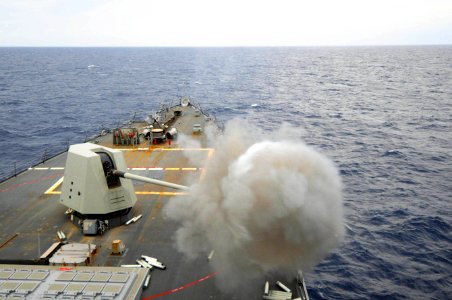 Flickr - Official U.S. Navy Imagery - USS Mustin fires its 5-inch gun.