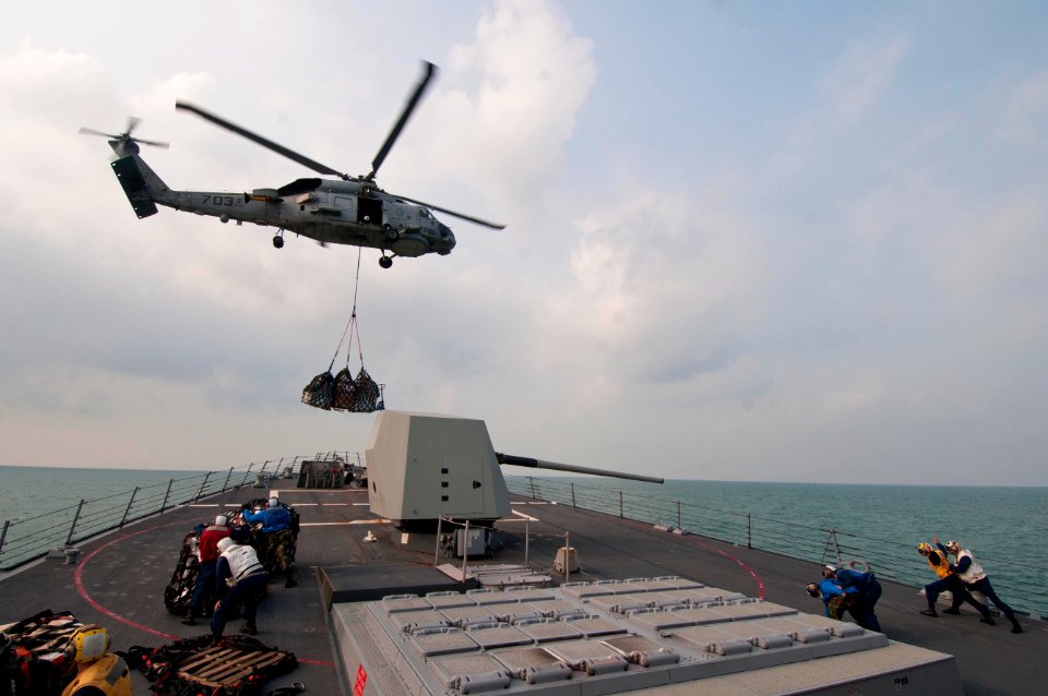 Flickr - Official U.S. Navy Imagery - USS Mustin conducts a replenishment at sea.