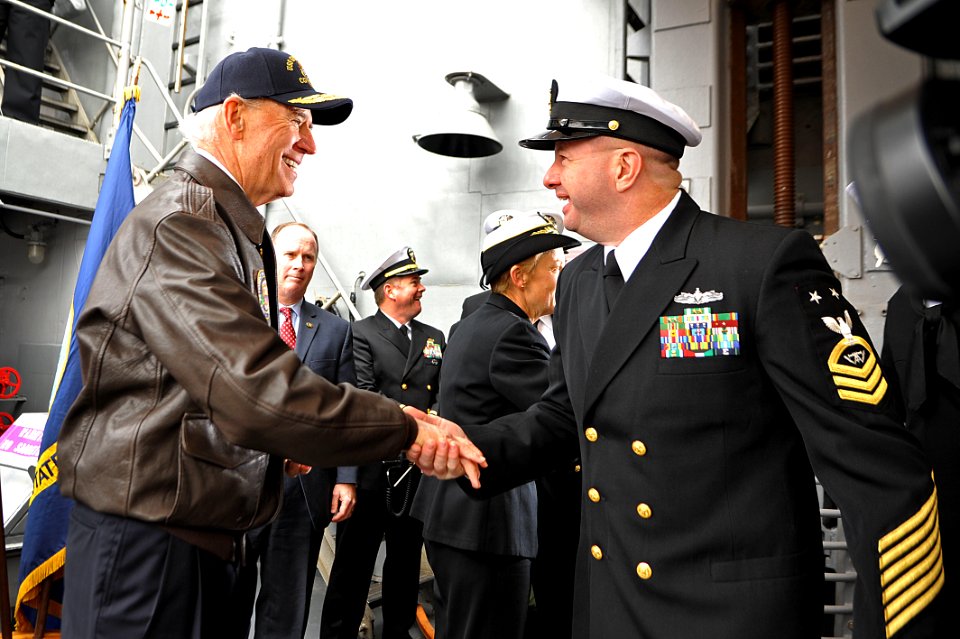 Flickr - Official U.S. Navy Imagery - Vice President Joe Biden shakes hands with Sailors as they depart the ship.