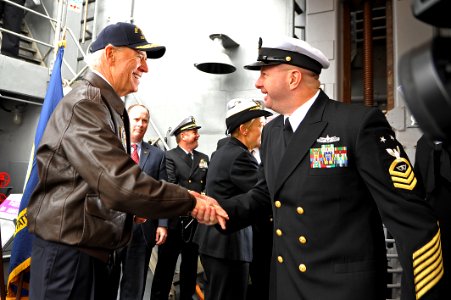 Flickr - Official U.S. Navy Imagery - Vice President Joe Biden shakes hands with Sailors as they depart the ship.