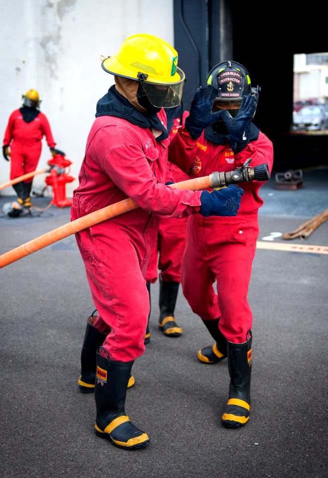 Flight deck firefighting training evolution at Joint Base Pearl Harbor-Hickam 150319-N-WF272-052