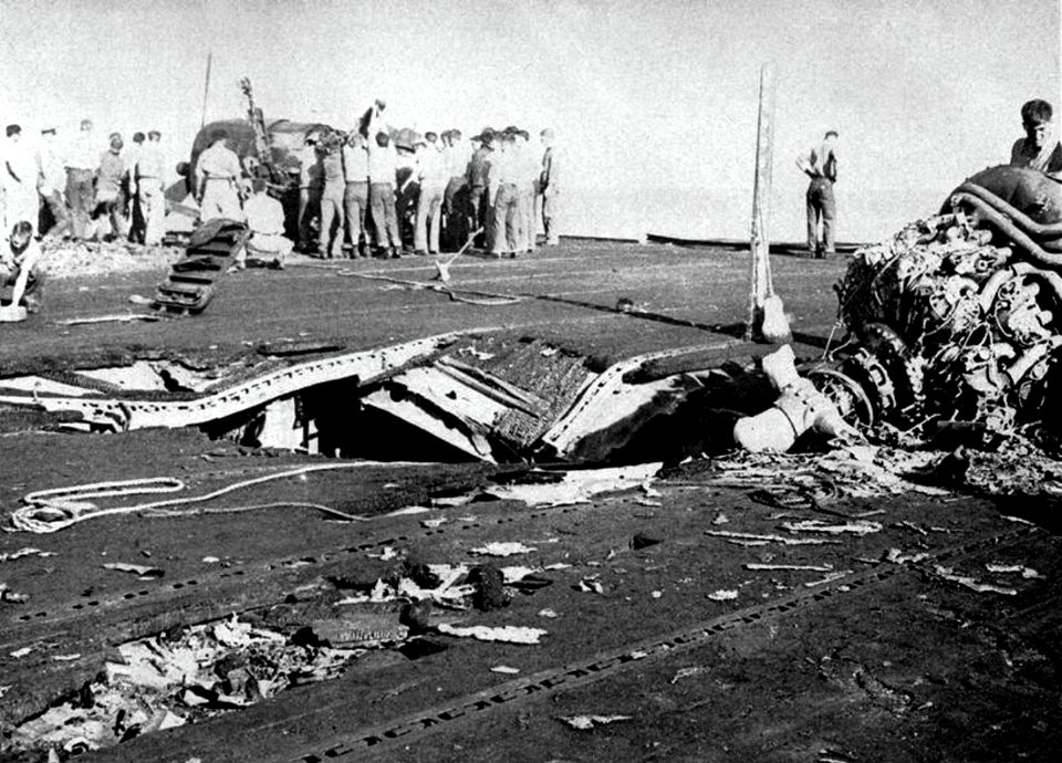 Flight deck damage aboard USS Belleau Wood (CVL-24) after she was hit by a Kamikaze, 30 October 1944