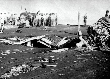 Flight deck damage aboard USS Belleau Wood (CVL-24) after she was hit by a Kamikaze, 30 October 1944
