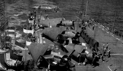Flight deck of USS Belleau Wood (CVL-24) after she was hit by a kamikaze, 30 October 1944