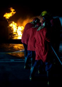 Flight deck firefighting training evolution at Joint Base Pearl Harbor-Hickam 150319-N-WF272-245
