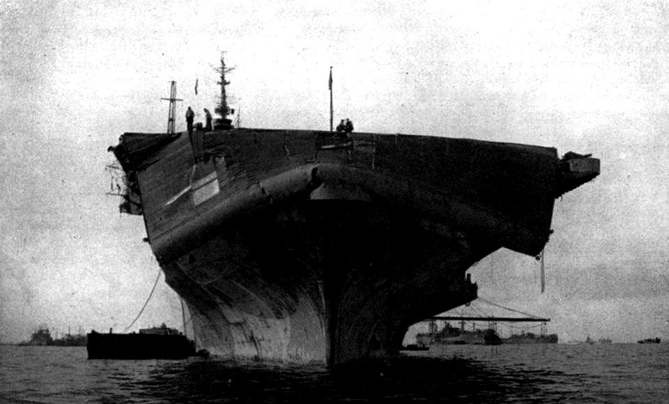 Flight deck of USS Bennington (CV-20) damaged by typhoon, 12 June 1945