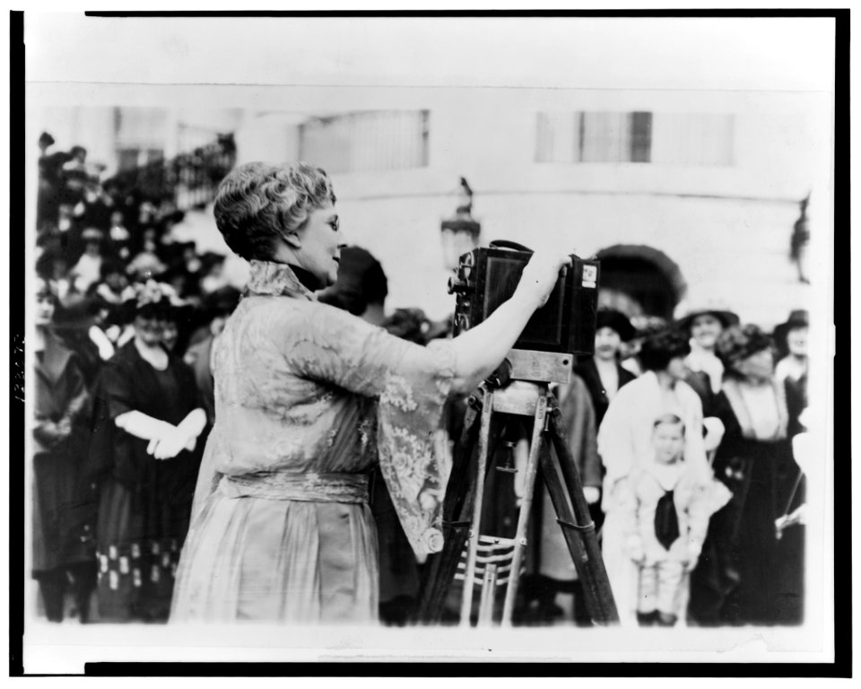 Florence Kling Harding operating a movie camera on the lawn at the White House, Washington, D.C. LCCN2002713192
