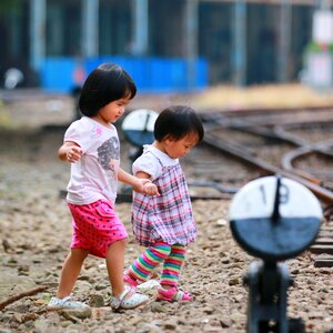 A person railroad little girls