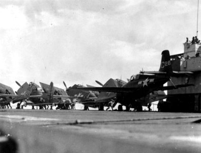 FM-2 Wildcat of VC-11 makes barrier landing on USS Nehenta Bay (CVE-74) on 21 January 1945 (NNAM.1996.253.7387.008)