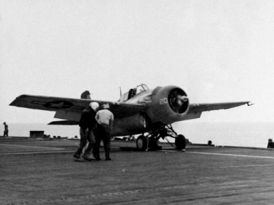 FM-2 Wildcat on catapult of USS Matanikau (CVE-101) on 27 July 1944 (80-G-376560)