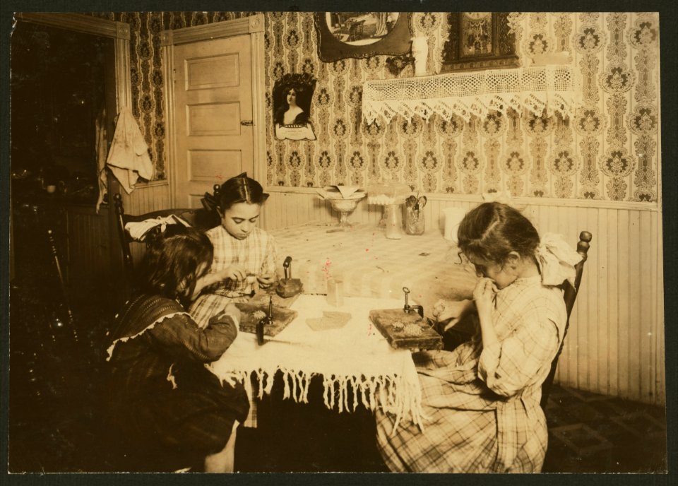 For Child Welfare Exhibit 1912-12.) Girls, six, nine, and eleven years old, working on chain-bags, Mrs. Antonio Caruso, 132 Knight St., Providence, R.I LOC cph.3b24281