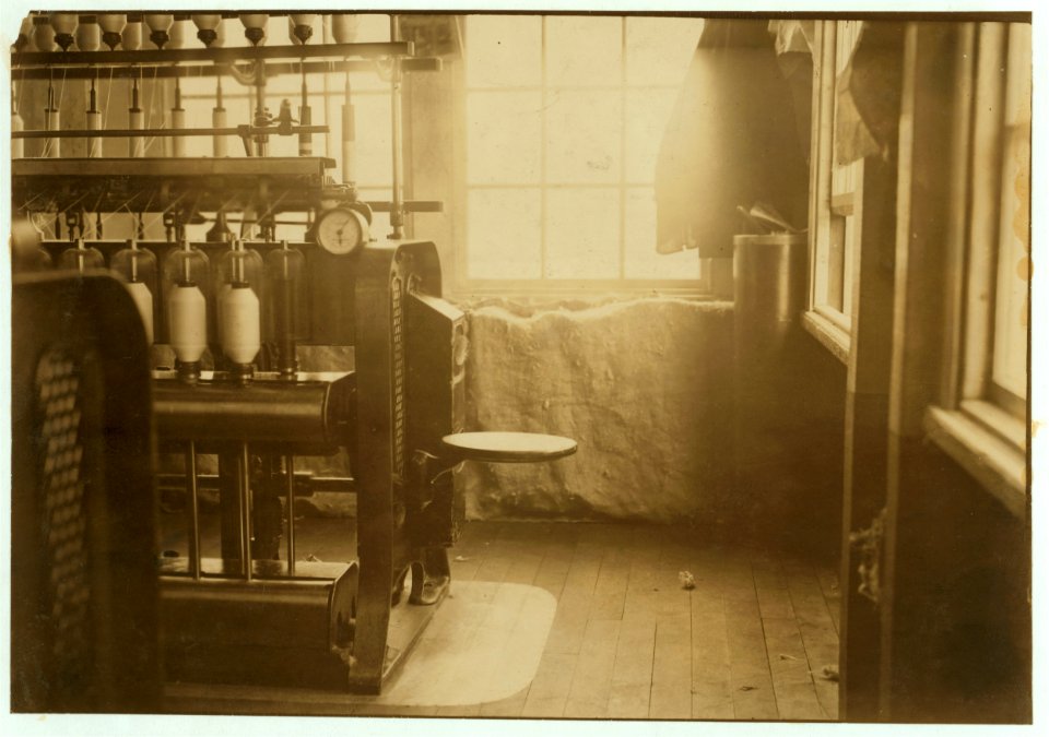For Child Welfare Exhibit 1912-13.) Cotton-mill employee using seat that is on the end of her machine. Pawtucket, R.I LOC nclc.02723