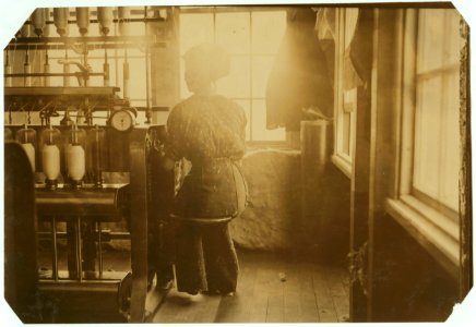 For Child Welfare Exhibit 1912-13.) Cotton-mill employee using seat that is on the end of her machine LOC nclc.02724
