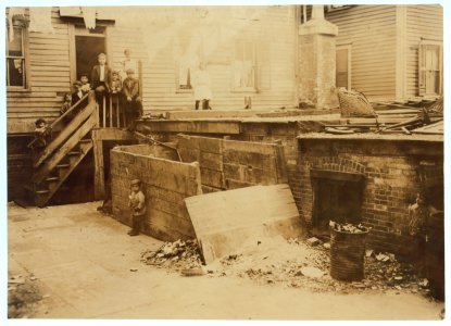For Child Welfare Exhibit 1912-13.) Entrance to the crowded, dirty house of a Midwife, rear tenement on Spruce Street, Providence, R.I LOC cph.3c02396