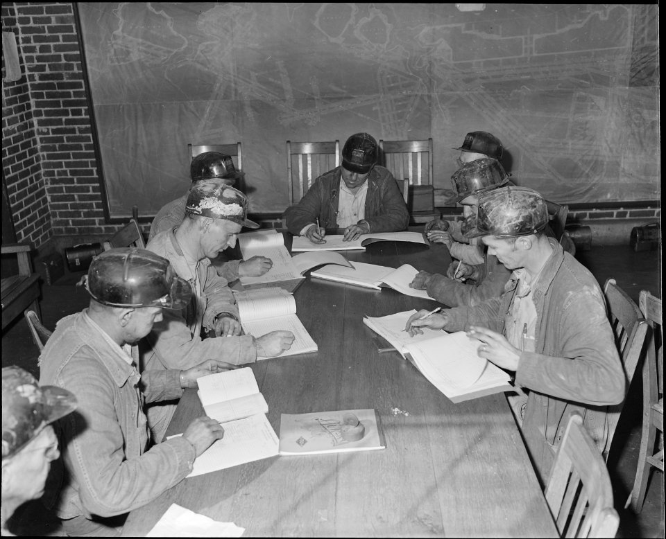 Foremen make out their daily reports. The Pocahontas Corporation, Mines 33-34, Bishop, Tazewell County, Virginia. - NARA - 541084