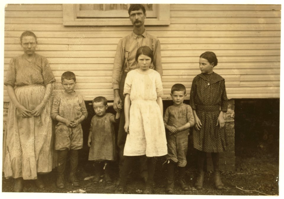 Gracie Clark, 268 A Street (with a white dress) has been a spinner in the filling room of Merrimack Mill for three years. Her Life Insurance Policy gives her age thirteen years now, so she LOC nclc.02891