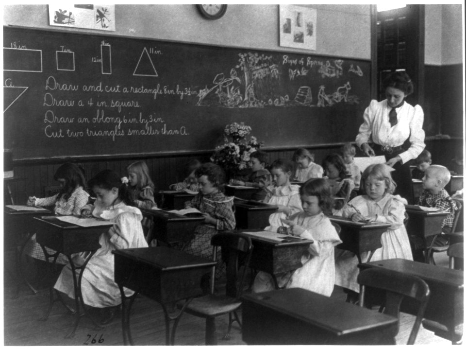 Grade school, Washington, D.C. - children drawing and cutting rectangles, triangles, etc. LCCN2001703718