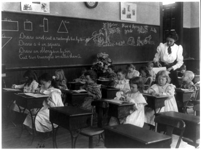 Grade school, Washington, D.C. - children drawing and cutting rectangles, triangles, etc. LCCN2001703718