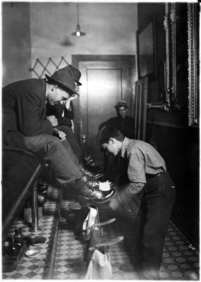 Greel's Shoe-Shining Parlor. Said he was 15 years old. Works some nights until 11 P.M. Indianapolis, Ind. - NARA - 523072