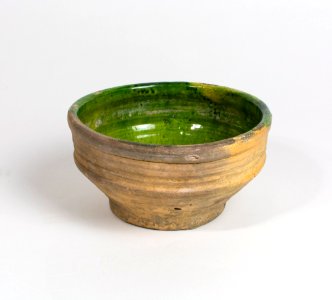 Green-glazed pottery bowl