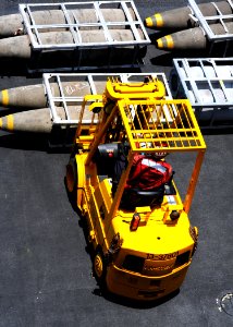 Forklift is moving bombs photo