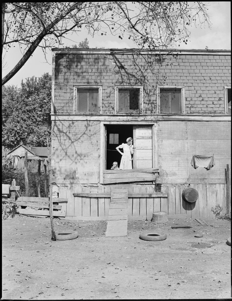 Former store building which has now been converted to a living quarters for miners and their families. This property... - NARA - 541180