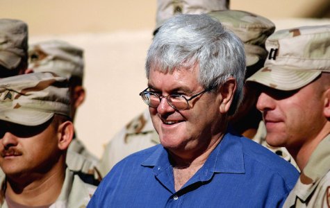 Former Speaker Newt Gingrich poses for photos with troops from the 51st and 101st Chemical Companies