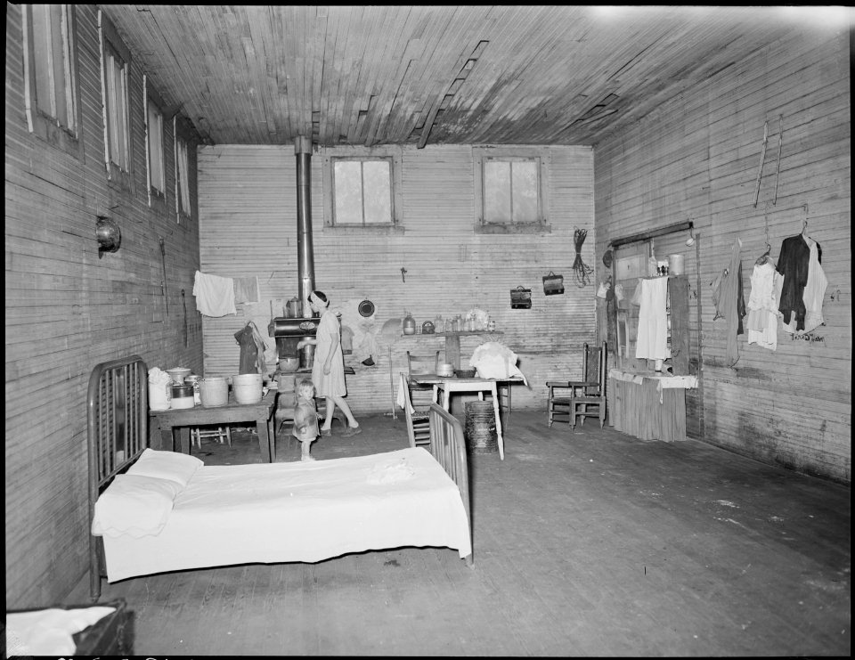 Former store building which has now been converted to living quarters for miners and their families. This property... - NARA - 541168