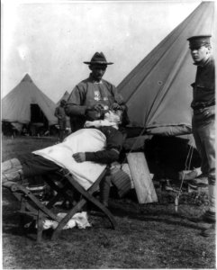 Fort Sam Houston, Tex., 1911-1912- field barber giving a shave LCCN2006677817