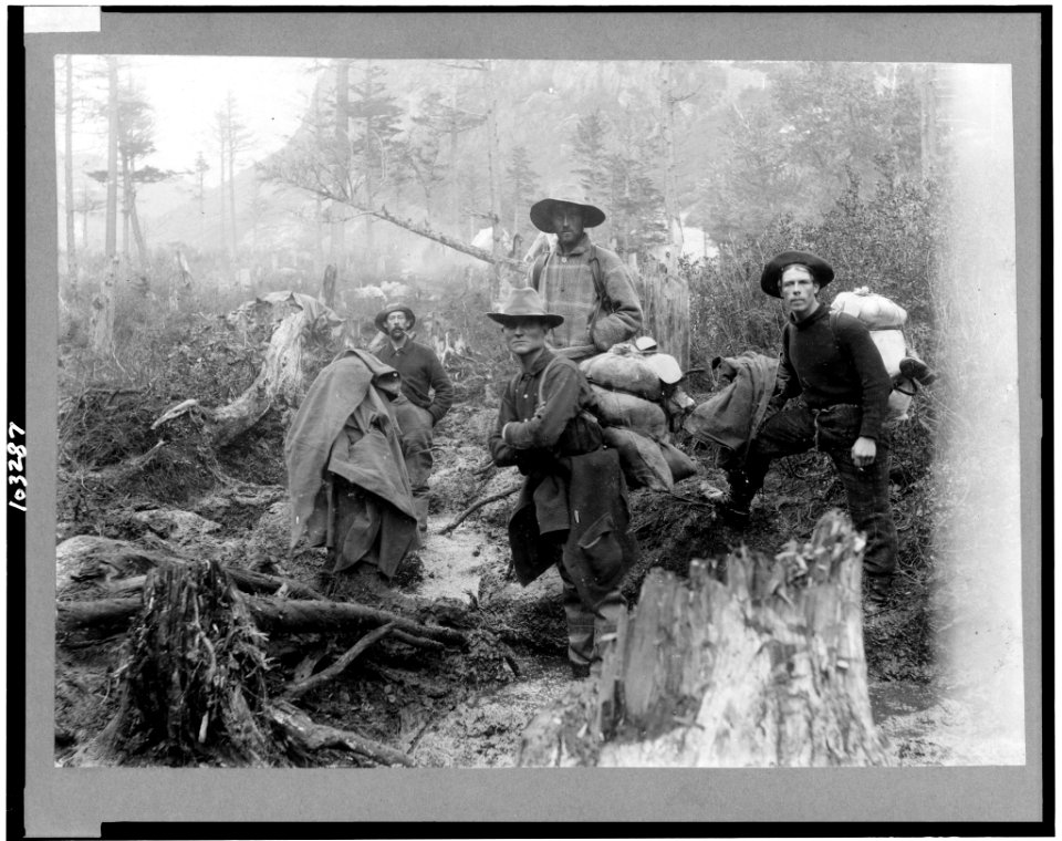 Four prospectors posed on trail, Alaska LCCN91731176