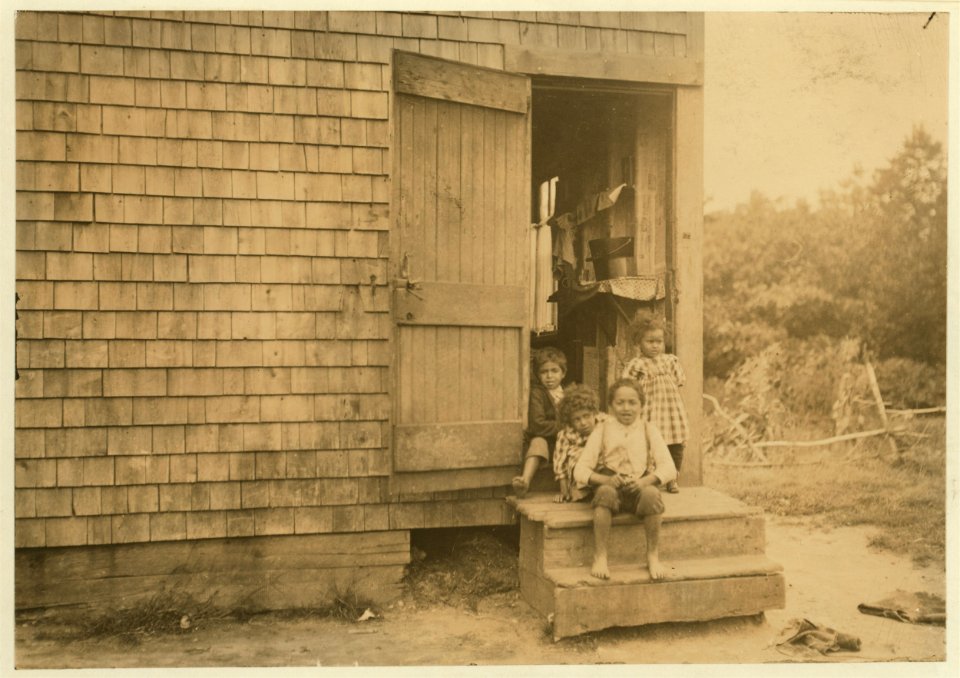 Four children - about 3 to 6 years old. Home all alone and settlement deserted. Mother and father working on Five-acre Bog. LOC cph.3b32036