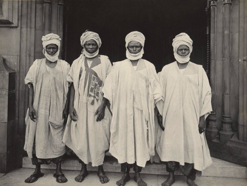 Four Hausa Gun Carriers of the South Nigerian Regiment by Sir (John) Benjamin Stone cropped