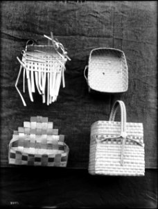 Four unidentified Indian baskets on display, ca.1900 (CHS-3957)