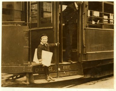 Francis Lance, 5 years old, 41 inches high. Sells regularly on Grand Avenue. He jumps on and off moving cars at risk of life. LOC nclc.03497