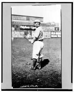 Frank B. LaPorte, St. Louis Browns baseball player, facing left, standing, wearing uniform, holding bat LCCN2003689087