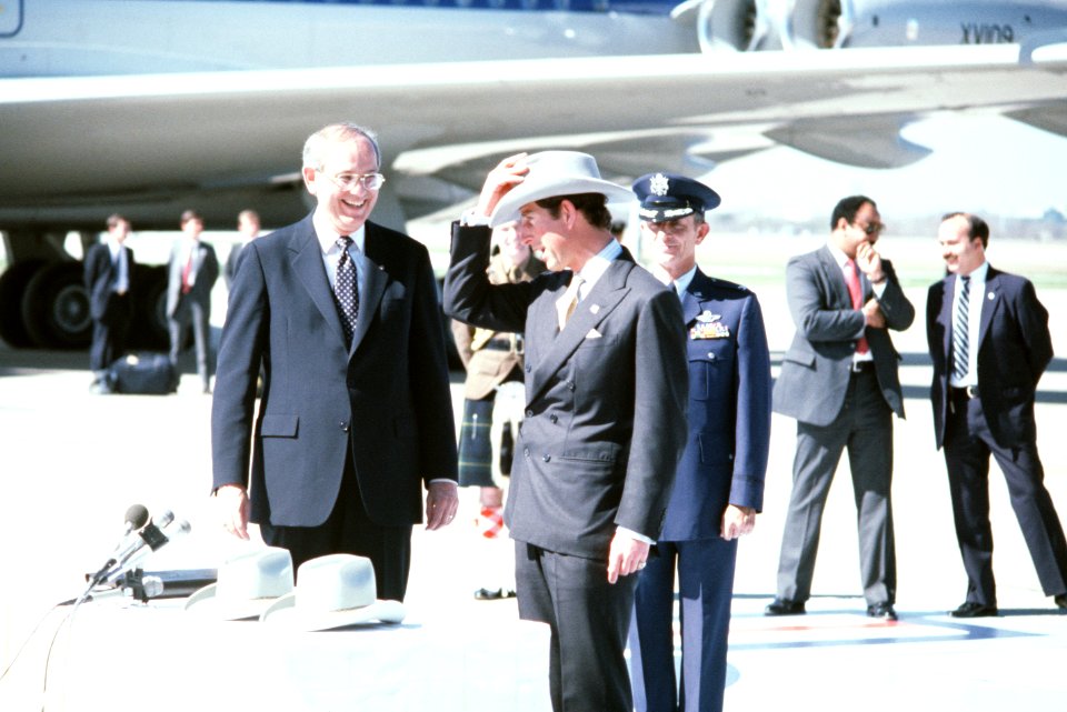 Frank Cooksey, Mayor of Austin, Texas, presents Prince Charles of Wales with a cowboy hat