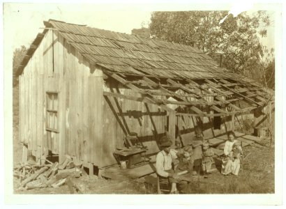 Frank Burditt and family. They rent this dilapidated shack and are trying to make a living off the meagre land near by. Oct. 11, 1921. LOC nclc.04424