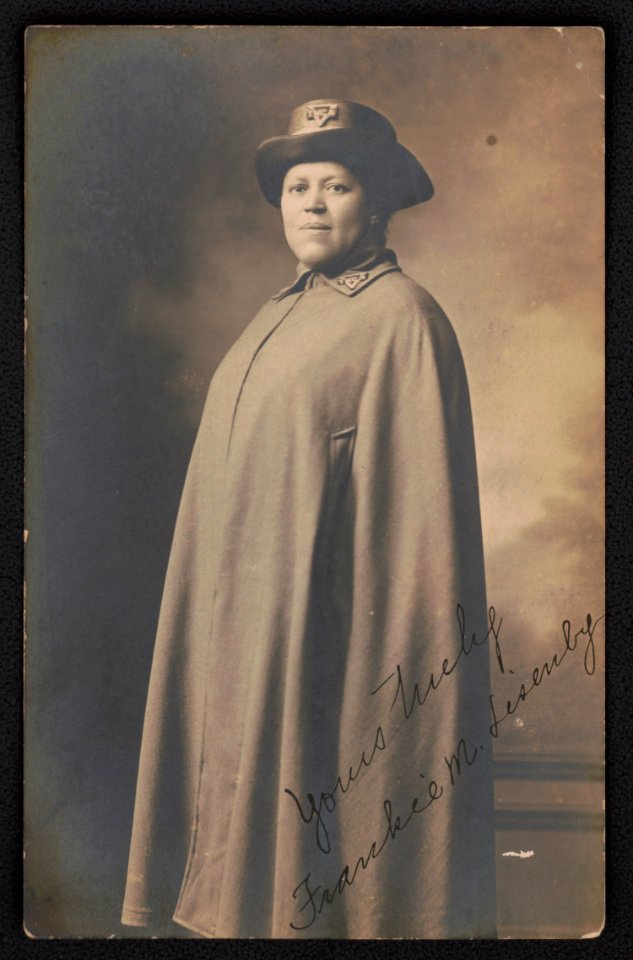 Frankie M. Lisenby in cape and hat with YWCA insignia LCCN2018645955