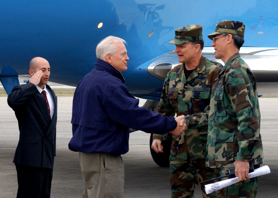 Gregory Martin and R. Michael Worden greet Joe Knollenberg
